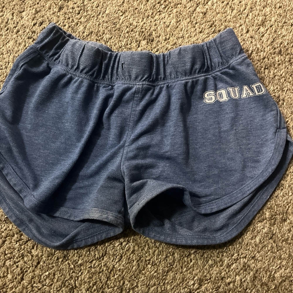 Blue Y2K shorts with words on back